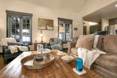 The living room offers a queen sofa sleeper for extra guests