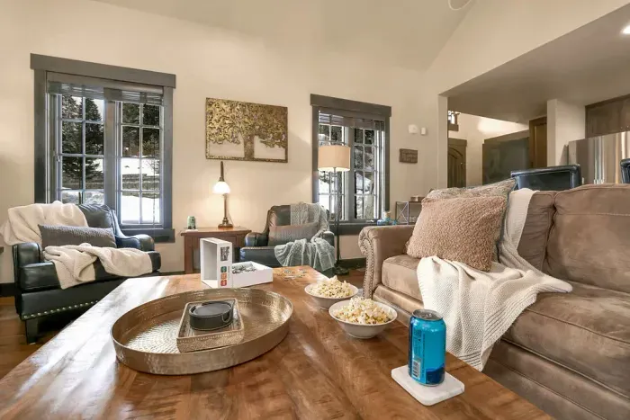 The living room offers a queen sofa sleeper for extra guests