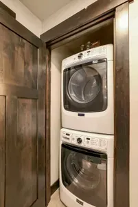 Full-sized washer and dryer in the primary suite for long stays and wet gear.