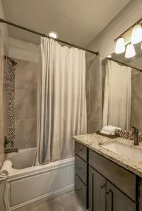 Guest ensuite bathroom upstairs so everyone gets real showers and space