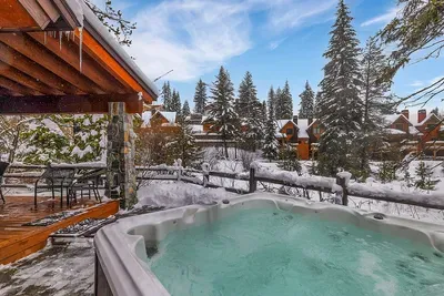 After a day on the slopes, unwind in your private hot tub under the stars