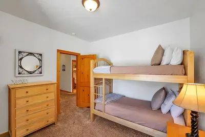 Twin bunk beds offers a calm retreat for young adventurers