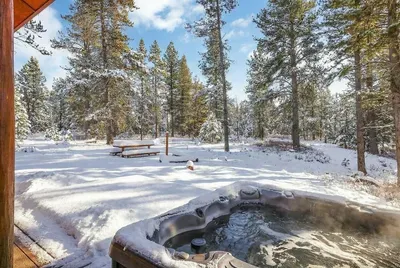 Step out from the primary bedroom straight to the hot tub for a quiet morning soak