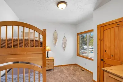Bunk room with twin‑over‑twin is a hit with kids and the young at heart