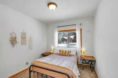 Guest bedroom with full bed—simple, comfortable, and easy to settle into.