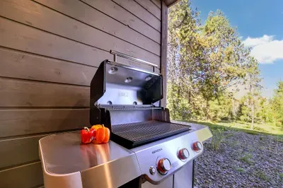 Weber grill fired up, kids running laps, dinner without the fuss.