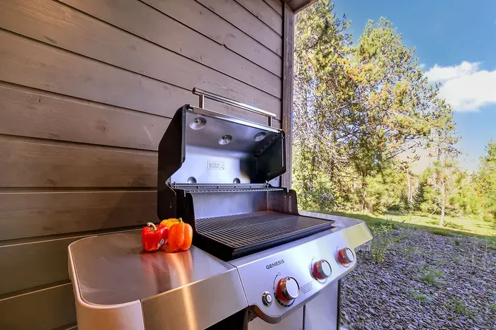 Weber grill fired up, kids running laps, dinner without the fuss.