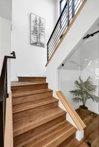 Upstairs you'll find three more bedrooms, 3 bathrooms, the great room loft, and the bonus room