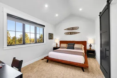 Soft light, mountain calm, serious comfort in the upstairs king suite
