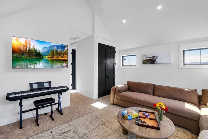 Versatile bonus boom: The upstairs bonus room is a multi-functional space perfect for relaxation, entertainment, or creativity