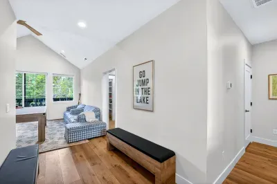 The loft is perfectly positioned as a buffer between the bunk room and queen bedrooms, giving each group its own zone.