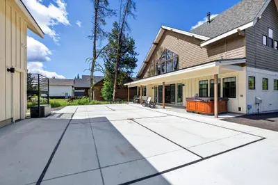 Backyard pickleball court offers built-in daily activity—from kids’ lessons with grandparents to friendly adult tournaments (paddles and balls included).