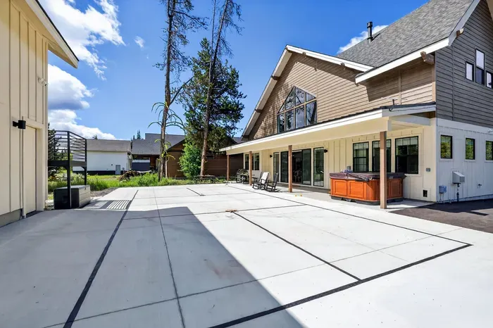 Backyard pickleball court offers built-in daily activity—from kids’ lessons with grandparents to friendly adult tournaments (paddles and balls included).