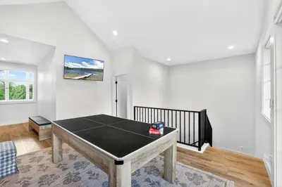 The loft’s flexible layout works as a movie room, game zone, or quiet reading corner, depending on your group’s needs.