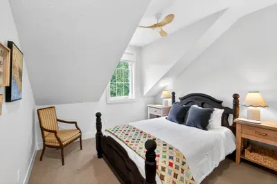 Each queen room is intentionally uncluttered, offering just what you need—comfort, storage, and serenity—without feeling like a typical rental.