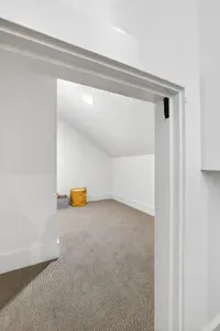 Upstairs bunk area pairs perfectly with the nearby loft, creating a dedicated “kids’ wing” that adults can supervise from a distance. Kids will love this hidden nook in the bunkroom closet.