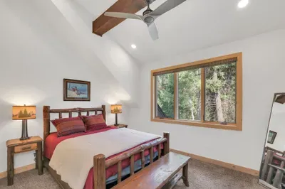 The northern guest bedroom also has a queen bed, as well as a smart TV