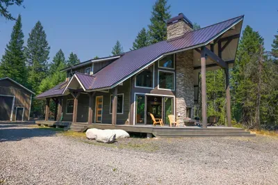 Knotty Pines is the perfect blend of natural splendor and luxury (detached garage inaccessible to guests)