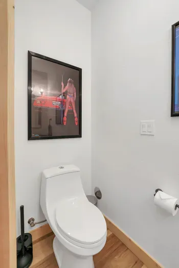 The powder room on the main floor is right off the mudroom