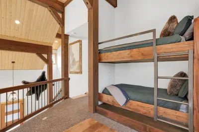 The loft is such a fun space--the hardwood built-in twin/twin bunk is among the most solid you'll find, and adds two additional sleeping options