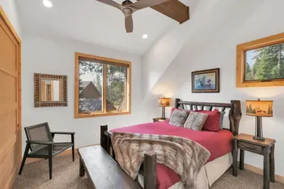 There are two guest bedrooms upstairs that share a full bath. Both offer queen beds. The closet in the southern bedroom is extra spacious