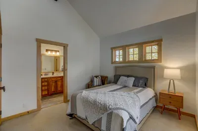 The secondary suite is upstairs and has a queen-sized bed, as well as a remodeled ensuite bathroom