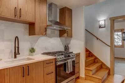 The primary ensuite is on the main floor, with the secondary suite on the second level