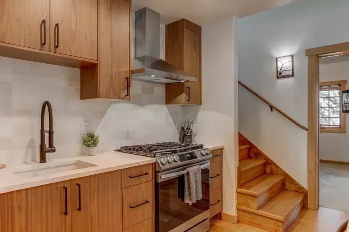 The primary ensuite is on the main floor, with the secondary suite on the second level