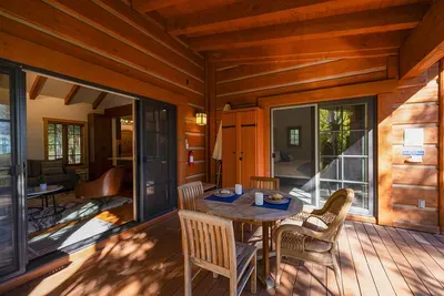The covered patio can be accessed from both the living room and primary bedroom, seamlessly blending the indoor and outdoor living spaces