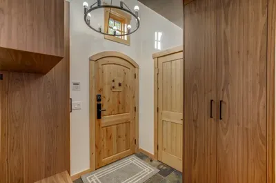 The natural wood accents brighten up the space--there's a powder room off the main entrance