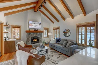 The gas fireplace makes this space extra warm and cozy, perfect for curling up with a good book. The sofa opens up into a sleeper for extra guests