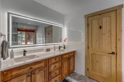 The newly remodeled primary ensuite--plenty of storage space and double vanities