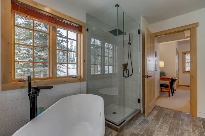 Soak away any sore muscles in the deep soaker tub--the newly tiled walk-in shower has a rain showerhead (we don't blame you if you never want to get out)