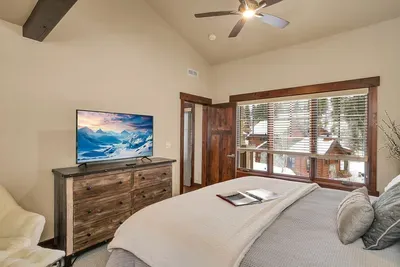Wake up to soft light and mountain air in the primary king suite.