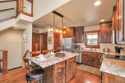 Cook, Dine, and Unwind in Style: Whether it's a cozy dinner or a festive gathering, this kitchen is designed for memorable moments