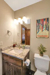 Convenience meets comfort: powder room on main floor