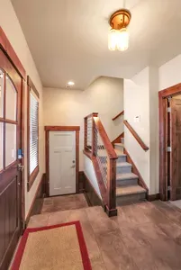Perfect blend of togetherness and privacy in the thoughtfully designed tri-level home—everyone has their own space to unwind. The entry floor has an ensuite bedroom (2 full/full bunks) and bathroom, as well as a full laundry room