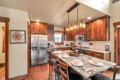 Gather around the spacious dining island to map out tomorrow’s lines and trails.