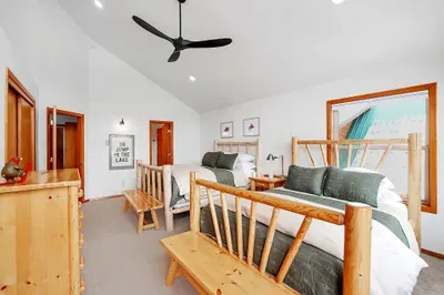 Two‑queen bedroom that works perfectly for families, golf groups, or ski buddies