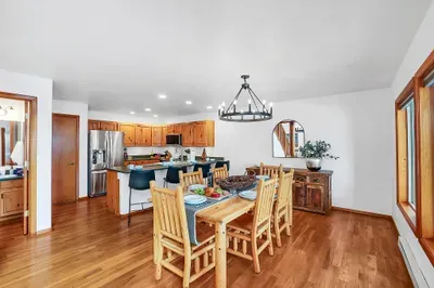 Open‑concept main floor keeps the whole group connected while you cook, lounge, and plan.