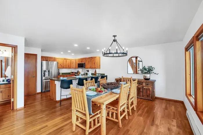 Open‑concept main floor keeps the whole group connected while you cook, lounge, and plan.