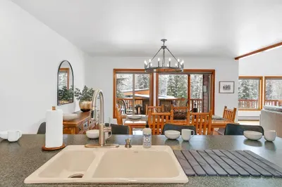 Breakfast bar doubles as a kids’ hangout, snack hub, or laptop landing zone.