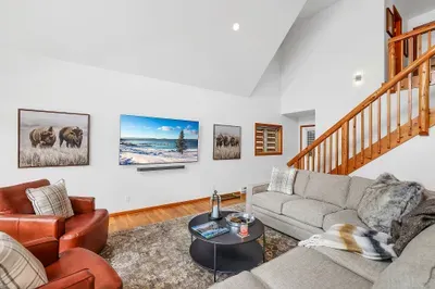 Smart two‑story layout in this McCall vacation home: living spaces down, bedrooms up, adventures everywhere.