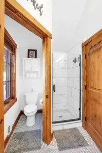 Modern fixtures with a mountain edge—no dated condo vibes here.