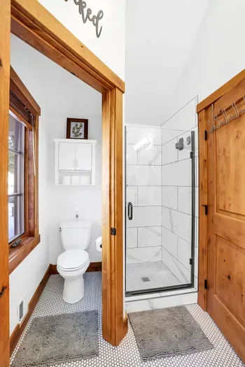 Modern fixtures with a mountain edge—no dated condo vibes here.