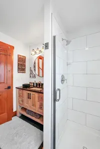 Hot showers and clean lines in the main floor full bath
