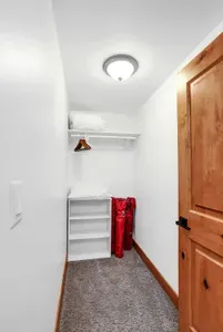 Walk-in closet for all the layers and gear, queen bed for deep sleep, smart TV for late-night replays.