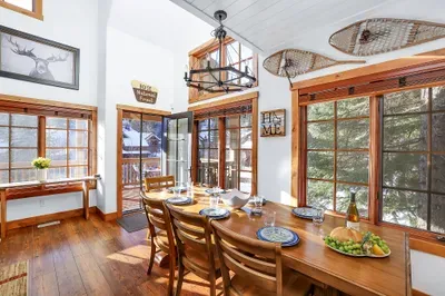 Dining table built for big meals, bad jokes, and one more round of cards