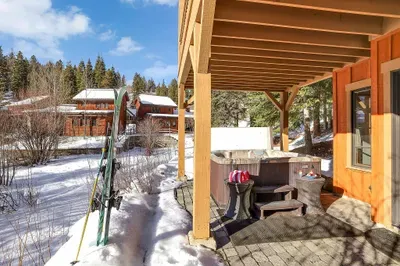 Private, covered hot tub so you can soak in a blizzard or summer storm