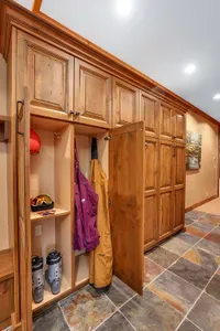 Come in off the snow, hang helmets and layers, rack the skis, and move easily from mudroom to the rest of the lodge